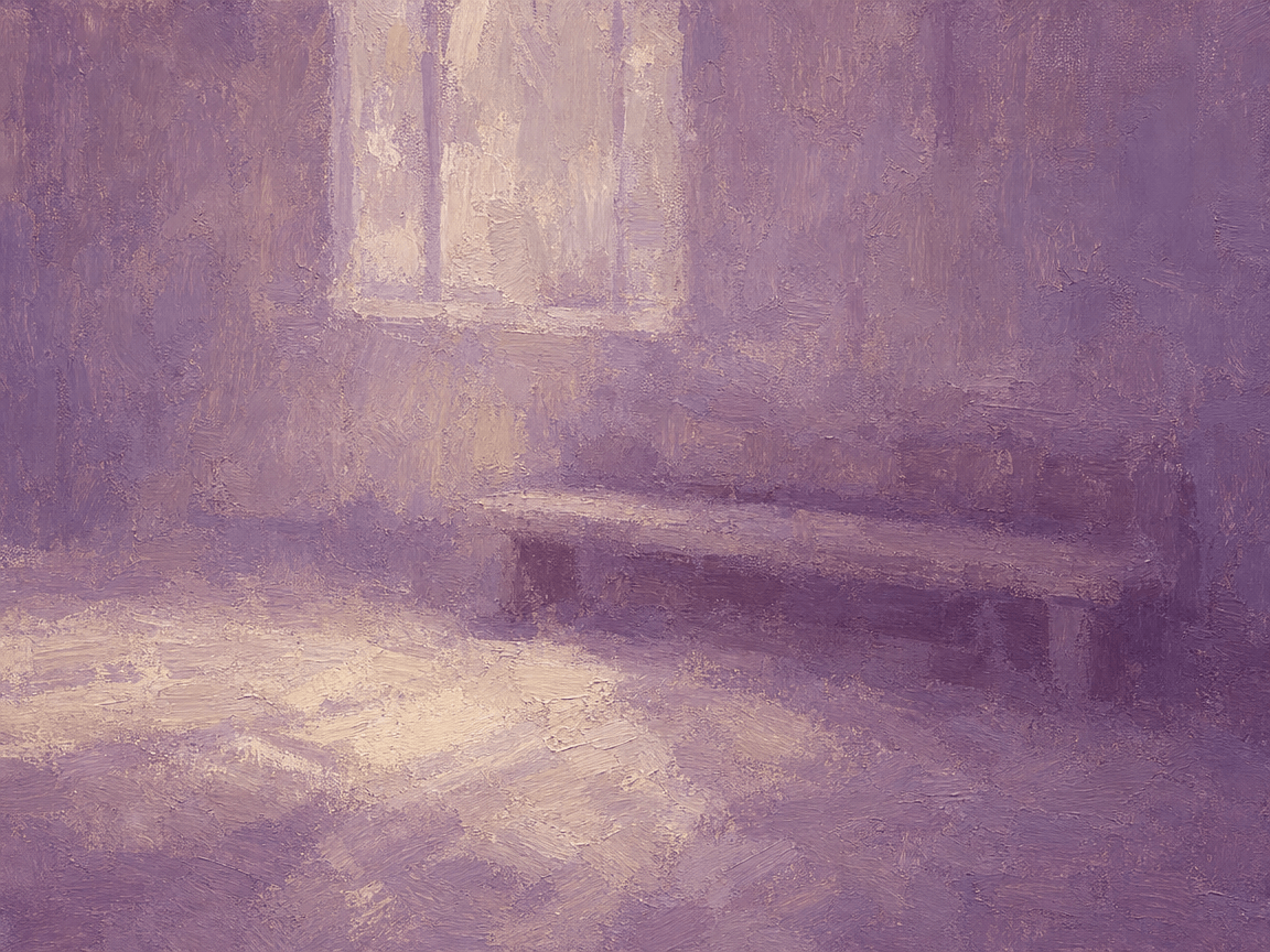 Waiting room bench below a window