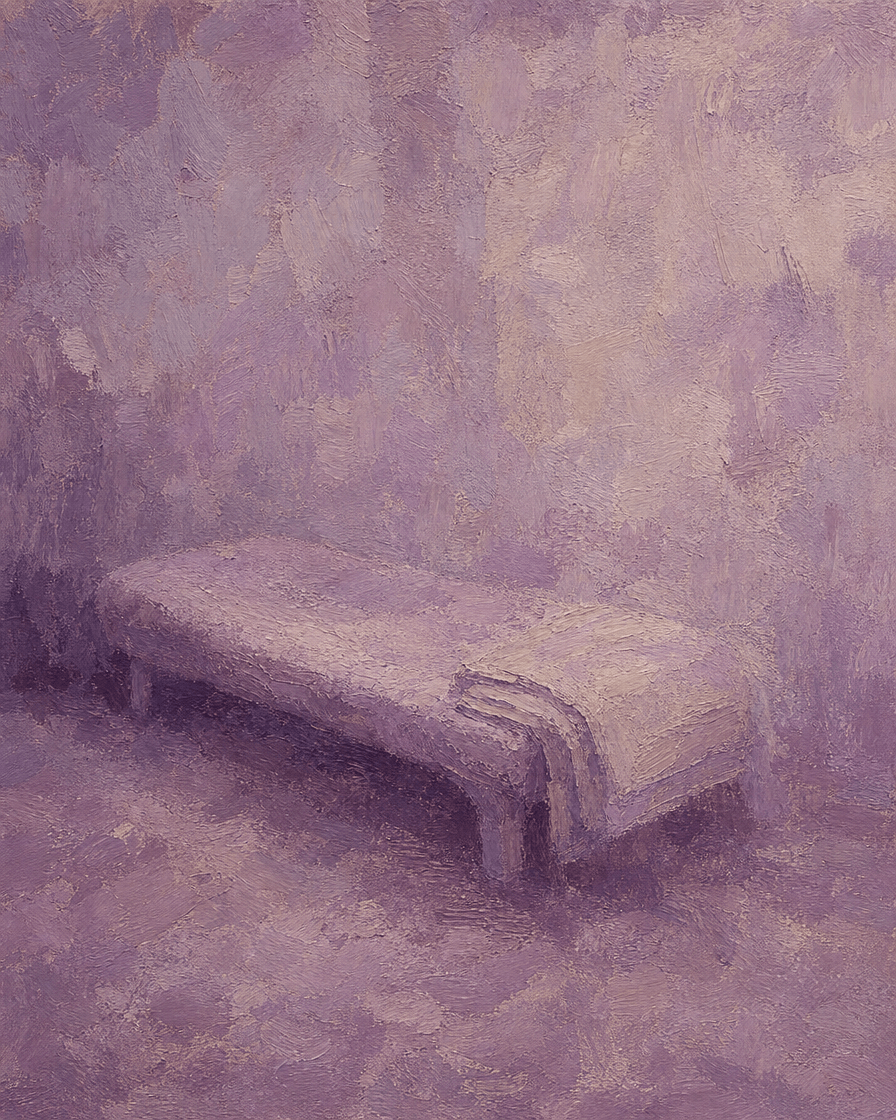 Treatment couch with a folded blanket